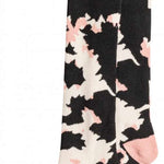 Roxy Women's Misty Sock 2023 - Pink socks with a repeating pattern of white snowflakes and trees.