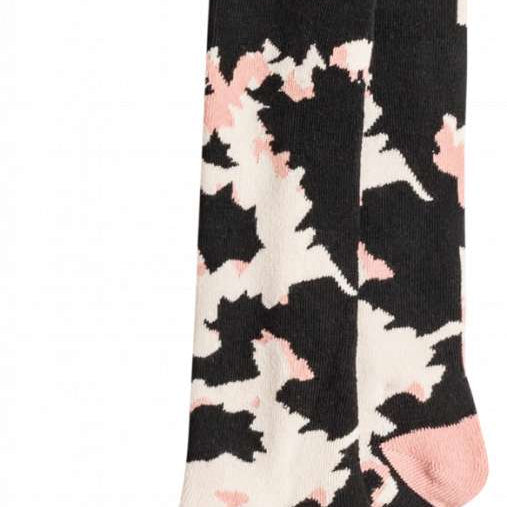 Roxy Women's Misty Sock 2023 - Pink socks with a repeating pattern of white snowflakes and trees.