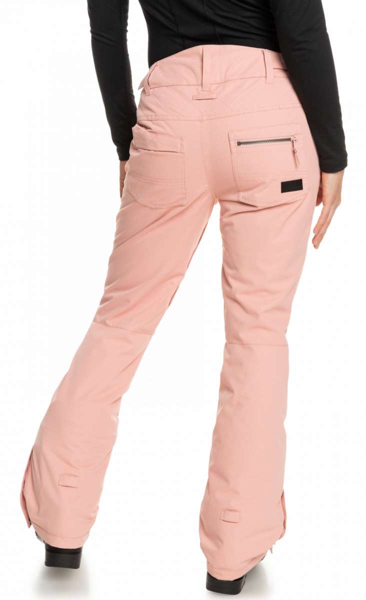 Roxy Women's Nadia Insulated Pant 2023 - A pair of light pink snow pants with a zippered pocket on the back right side.