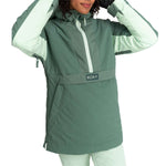 Roxy Women's Radiant Lines Pullover Jacket 2024 - A dark green jacket with a white stripe down the center and a hood, worn by a model with curly hair.