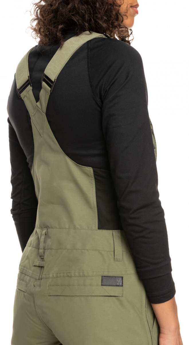 Roxy Women's Rideout Insulated Bib Pant 2023 - A pair of olive green bib pants with adjustable straps and a zippered fly.
