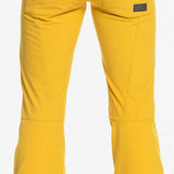 Roxy Women's Rising High Pant 2023 - A pair of yellow ski pants with a black waistband and zippered pockets.