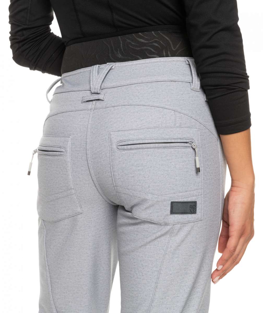 Roxy Women's Rising High Pant 2023 - A pair of light gray pants with a subtle pattern and zippered pockets on both sides.