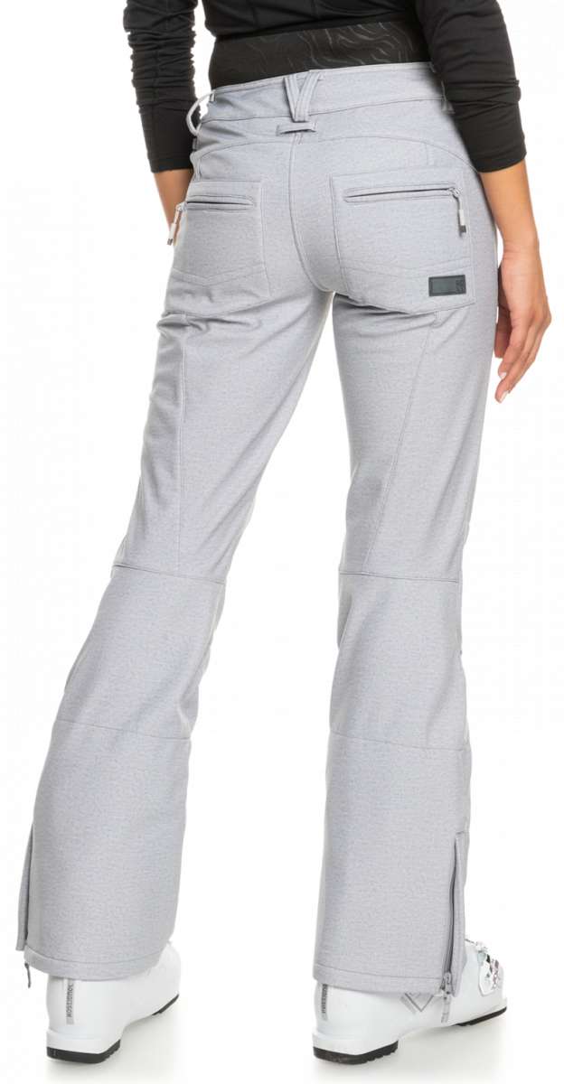 Roxy Women's Rising High Pant 2023 - Light gray snow pants with zippered pockets and a black logo on the left thigh.