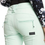 Roxy Women's Rising High Pant 2023 - A pair of light blue pants with a subtle floral pattern on the upper thigh area.