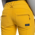 Roxy Women's Rising High Pant 2023 - A pair of yellow ski pants with zippered pockets and a black waistband.