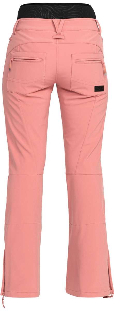 Roxy Women's Rising High Pant 2024 - A pair of pink snow pants with a black waistband and two zippered pockets on the back.