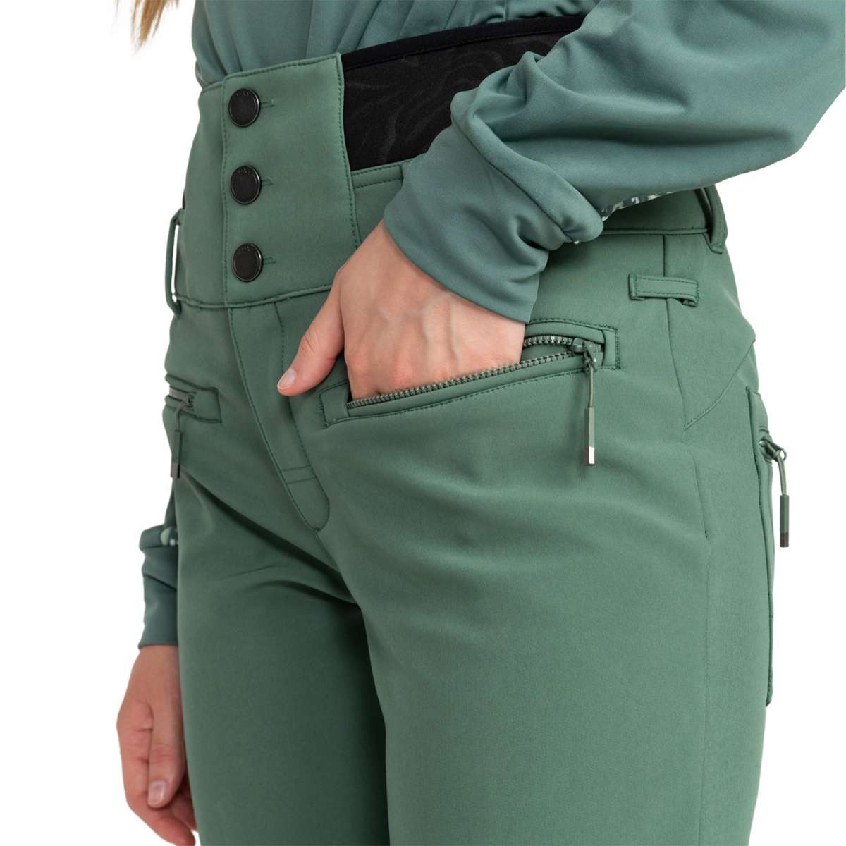 Roxy Women's Rising High Pant 2024 - A pair of women's high-waisted snow pants with a black and white geometric pattern on the side pockets.