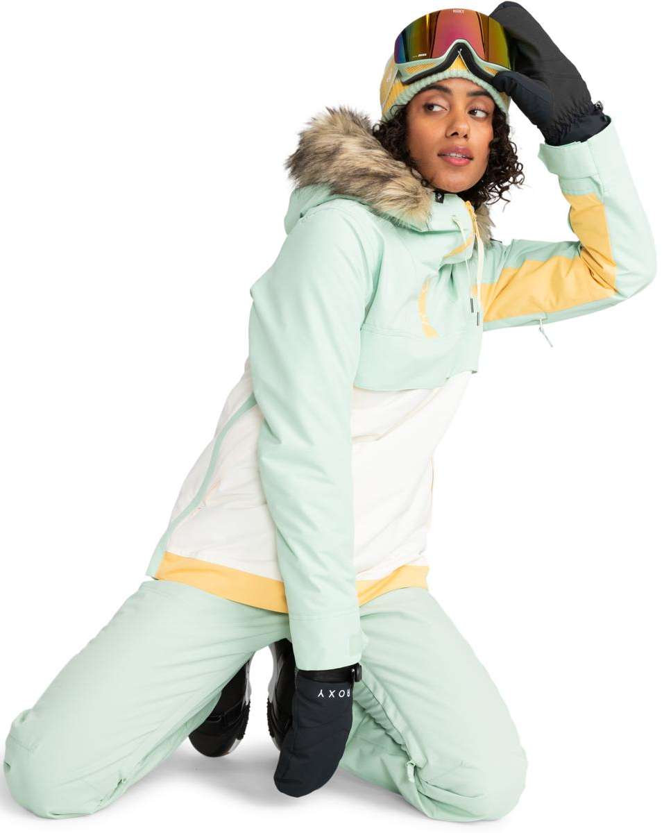Roxy Women's Shelter Insulated Jacket 2024 - A mint green jacket with a fur-lined hood and yellow accents on the chest, sleeves, and waistband.