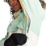 Roxy Women's Shelter Insulated Jacket 2024 - A mint green jacket with a fur-lined hood and yellow accents on the zipper and trim.