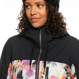 Roxy Women's Stated Insulated Jacket 2023 - A black jacket with a colorful abstract design on the chest and sleeves.