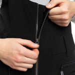 Roxy Women's Summit Bib Shell Pant 2023 - Black bib shell pant with white logo on left thigh and black drawstring at waist.