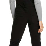 Roxy Women's Summit Bib Shell Pant 2023 - Black bib shell pants with a subtle white stripe on the side of each leg.
