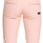 Roxy Women's Summit Bib Shell Pant 2023 - Light pink bib shell pants with a subtle floral pattern on the side of the leg.