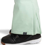 Roxy Women's Summit Bib Shell Pants 2024 - Light green bib shell pants with a black logo on the left leg and a zipper at the ankle.