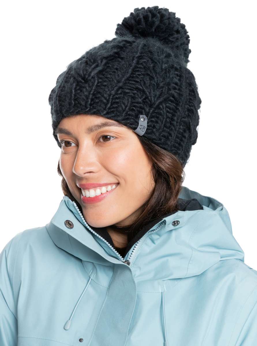 Roxy Women's Winter Beanie 2022 - A black beanie with a large pom-pom on top.