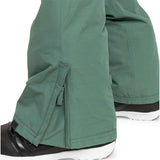 Roxy Women's Rideout Insulated Bib Pant 2024 - A pair of green snow pants with a zippered pocket on the side and adjustable velcro straps at the waist.