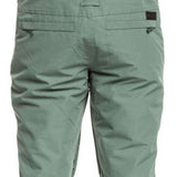 Roxy Women's Rideout Insulated Bib Pant 2024 - A pair of light green snow pants with a geometric pattern on the side and black accents.