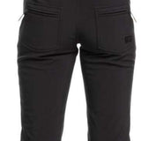 Roxy Women's Rideout Insulated Bib Pant 2024 - Black bib pants with a subtle pattern of small, light-colored snowflakes on the upper thigh area.