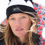 Roxy X Rowley Women's Beanie 2022 - A black beanie with a white stripe and a rectangular patch that says "ROWLEY XY" in white letters.