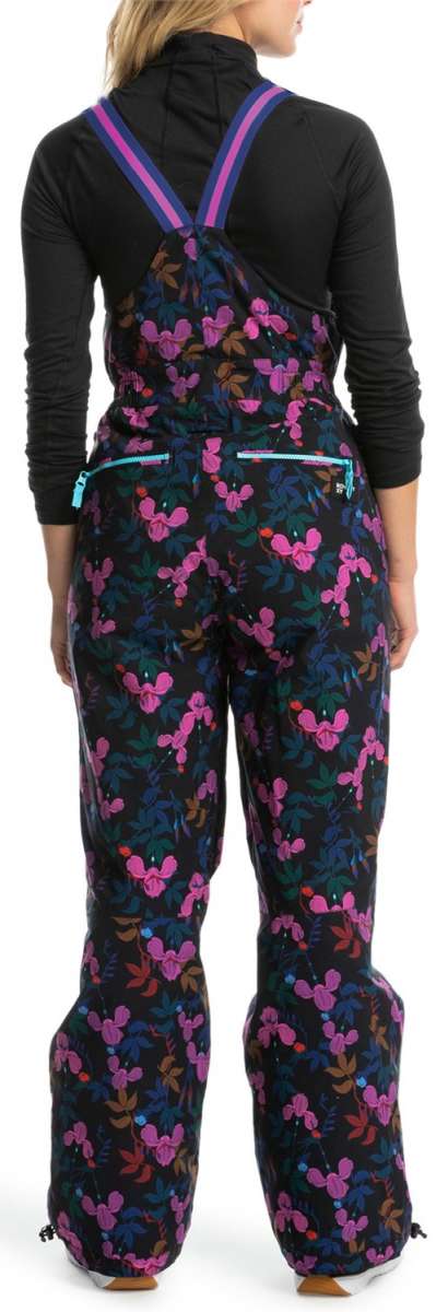 Roxy X Rowley Women's Insulated Bib Pants 2024 - Black bib pants with a pink floral pattern and blue trim on straps.