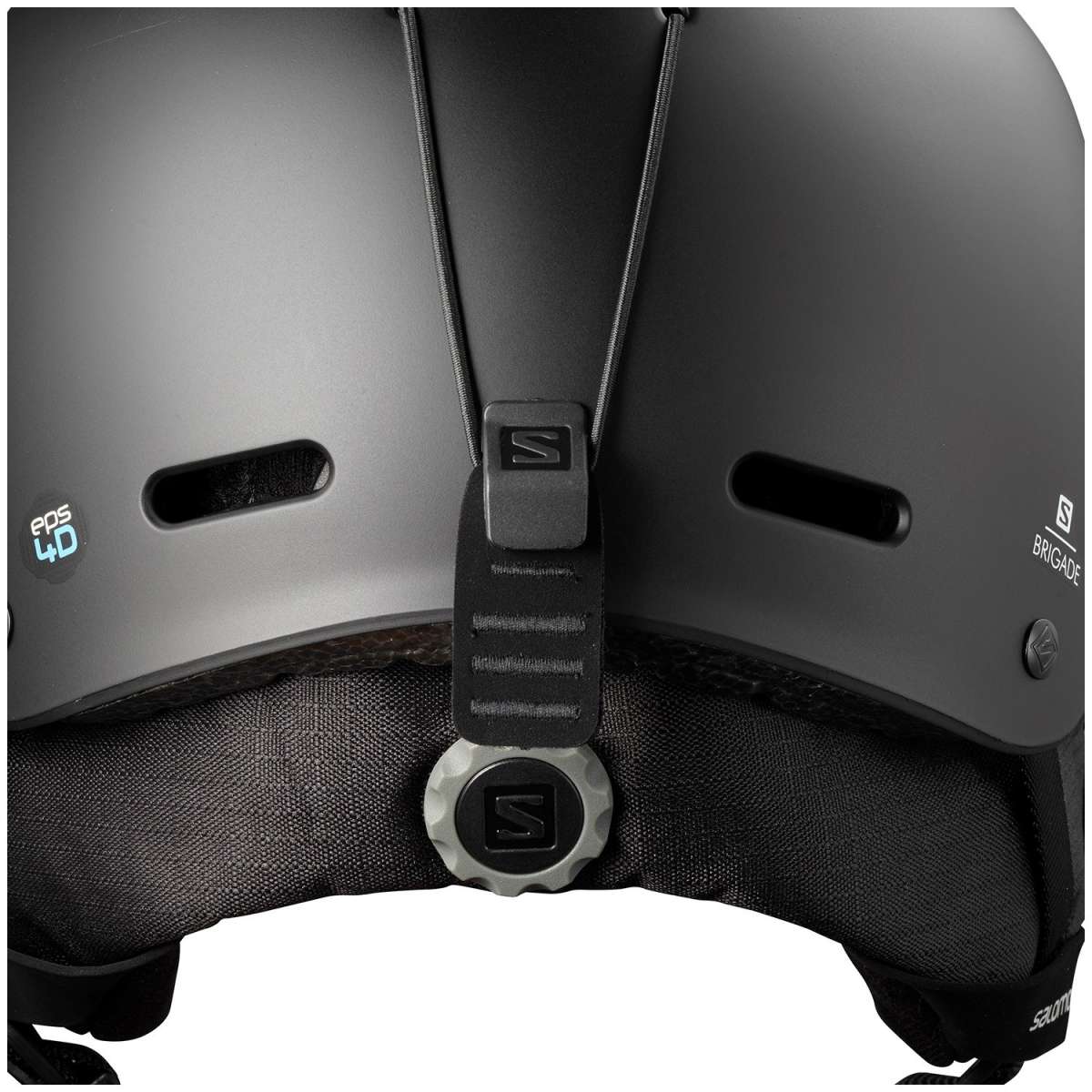 Salomon Brigade Helmet 2023 - A matte black helmet with a white logo on the side and a strap closure at the back.