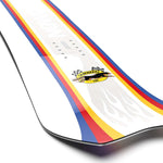 Salomon Junior's Dancehaul Grom Snowboard 2024 - A white snowboard with a red, yellow and blue stripe down the middle.