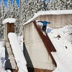 Salomon Depart 1.0 Ski 2026 - A black ski with a red stripe down the middle and white lettering on the top of the blade.