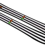 Salomon Depart 1.0 Ski 2026 - A pair of skis with a black and white striped pattern on their topsides, featuring orange bindings.