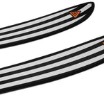 Salomon Depart 1.0 Ski 2026 - A pair of skis with a black and white striped design, featuring a distinctive orange logo on the tip.