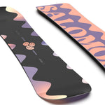 Salomon Girls Oh Yeah Grom Snowboard 2024 - A black snowboard with a pink and purple abstract pattern on top.