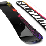 Salomon Huck Knife Pro Snowboard 2024 - Black snowboard with yellow and red lettering on top, featuring a black background with a gradient of orange at the tip.
