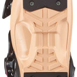 Salomon Junior's T3 RT Ski Boots 2024 - A pair of tan ski boots with a black strap and buckle on the side.