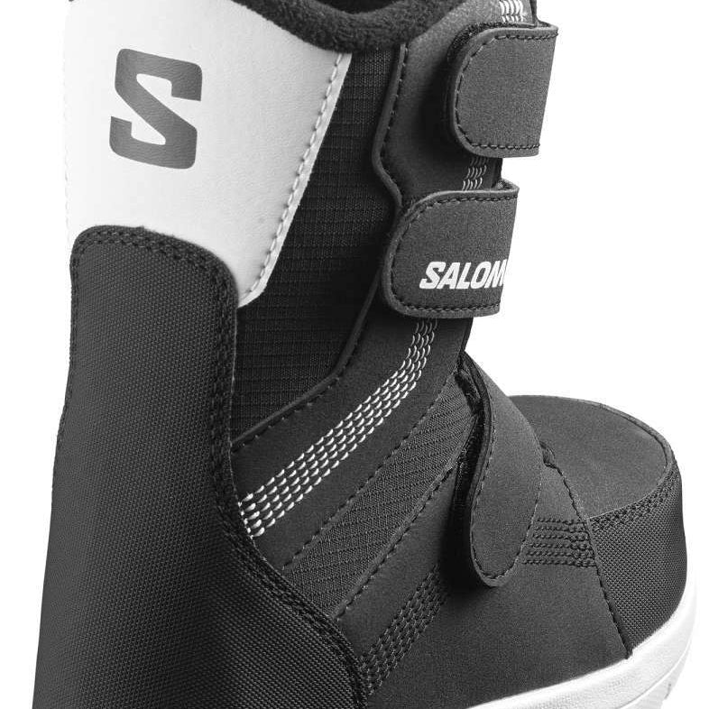 Salomon Juniors Whipstar Snowboard Boot 2023 - A black snowboard boot with a white strap and silver hardware.