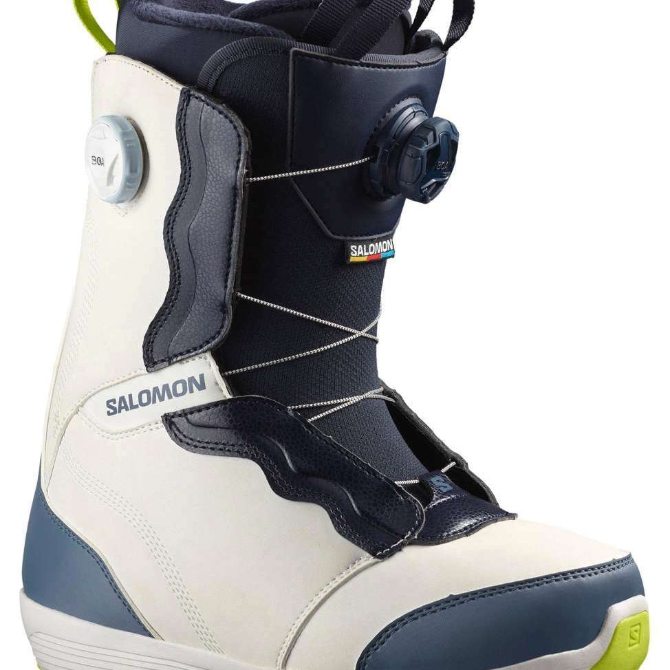 Salomon Women's Ivy BOA SJ Snowboard Boot 2023 - A black and white snowboard boot with a lime green pull tab on the back strap.