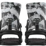 Salomon Women's Nesta Snowboard Bindings 2024 - A pair of black and white snowboard bindings with a mountain graphic on top, featuring a black strap and buckle.