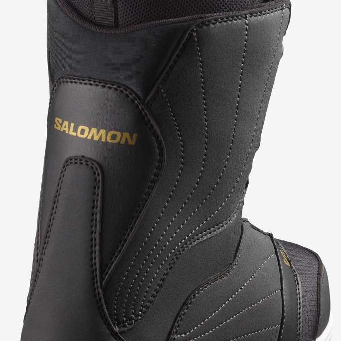 Salomon Ladies Pearl BOA Snowboard Boot 2023 - A black snowboard boot with a gold logo on the side and a white sole.