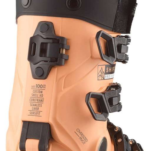 Salomon Ladies Shift Pro 110 AT Ski Boots 2024 - A pair of tan ski boots with black buckles and straps, featuring a seamless liner.