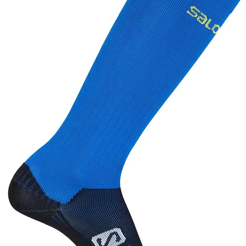 Salomon S/Race Sock 2023 - A pair of blue socks with a yellow logo on top and white lettering at the bottom.