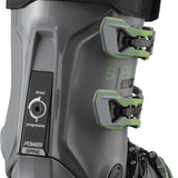 Salomon S/Pro Alpha 120 Ski Boots 2023 - A pair of black ski boots with lime green accents and a textured pattern on the tongue.
