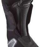 Salomon Shift Pro 130 AT Ski Boots 2024 - Black ski boots with a textured pattern on the toe and heel areas, featuring a strap at the top for closure.