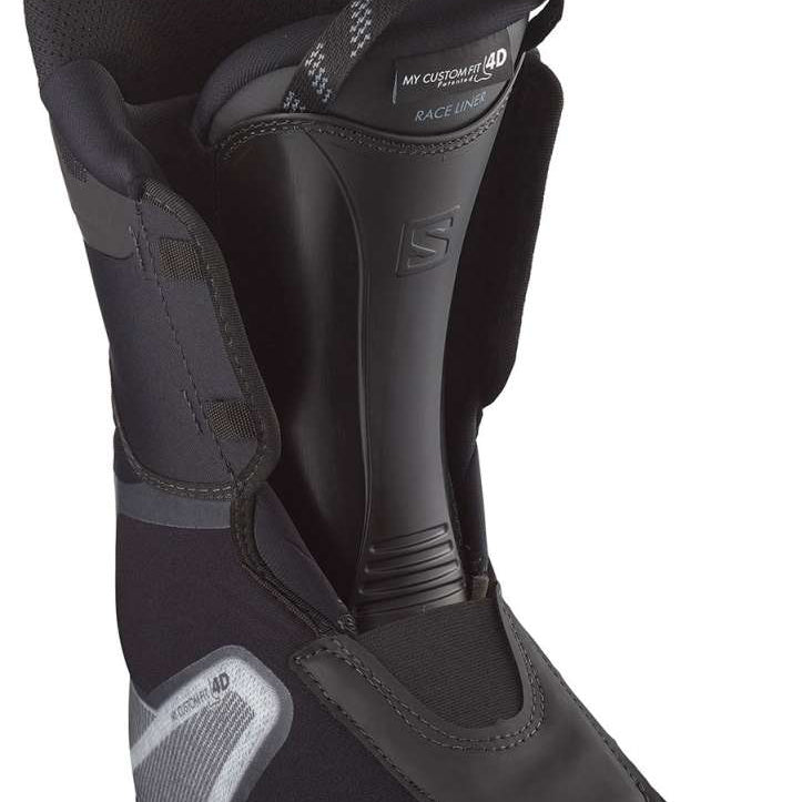 Salomon Shift Pro 130 AT Ski Boots 2024 - Black ski boots with a textured pattern on the toe and heel areas, featuring a strap at the top for closure.