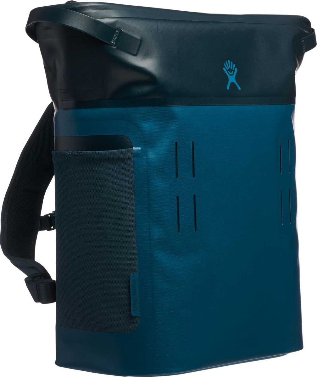 Hydro Flask 20L Day Escape Soft Cooler Pack - A dark gray soft-sided cooler pack with a zippered main compartment and two smaller pockets on the front, featuring a logo in light blue at the top.