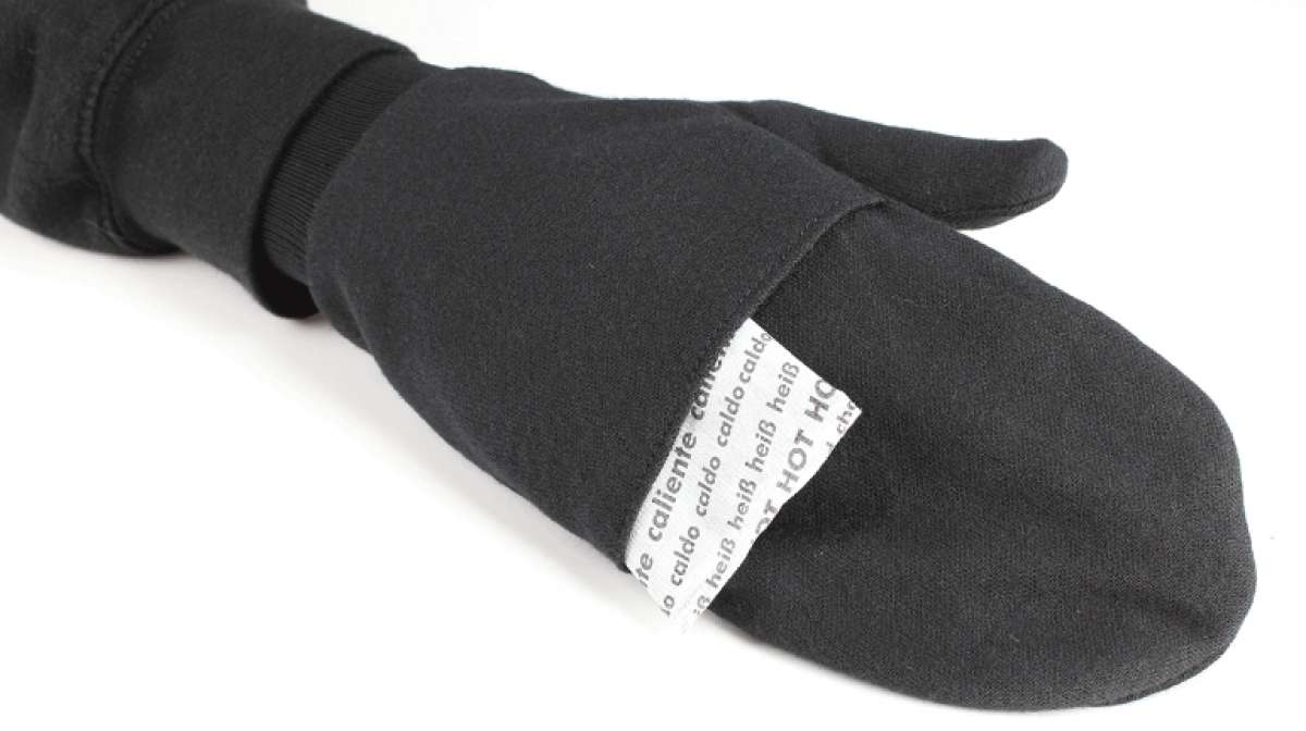 Seirus Thermax Heat Pocket Mitten Liner - A black mitten with a white label on the back of the hand that reads "Thermax" in gray letters.