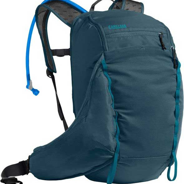 Camelbak Women's Sequoia 24 100 oz Hydration Pack - A dark-colored hydration pack with a zippered front pocket and two adjustable shoulder straps.