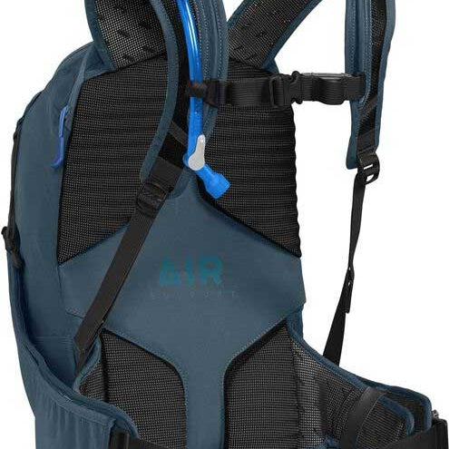 Camelbak Women's Sequoia 24 100 oz Hydration Pack - A blue hydration pack with a zippered front pocket and two mesh side pockets, featuring a water bladder with a blue cap.