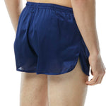TYR Men's Swim Resistance Short Swimsuit - A pair of navy-blue men's swim trunks with a white stripe down the side and a drawstring waistband.