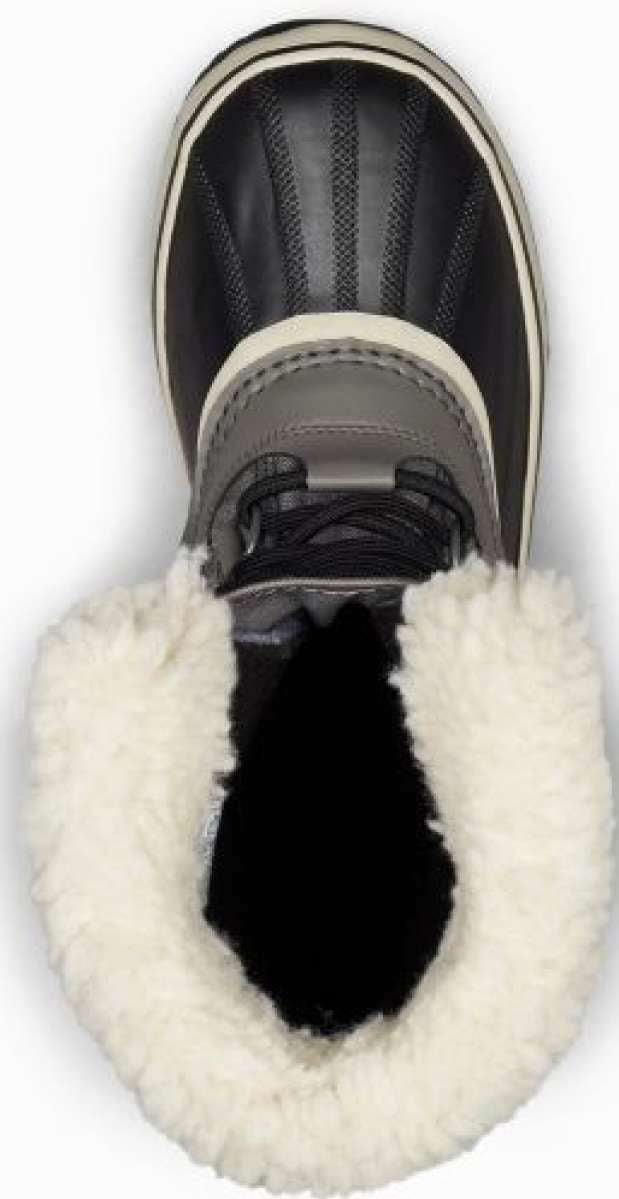 Sorel Ladies Winter Carnival Boot 2022-2023 - A black boot with a white sole and trim, featuring a thick, fluffy white fur lining around the ankle area.