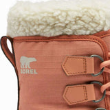 Sorel - A pair of women's boots with a white fur trim around the top and a brown leather upper portion.