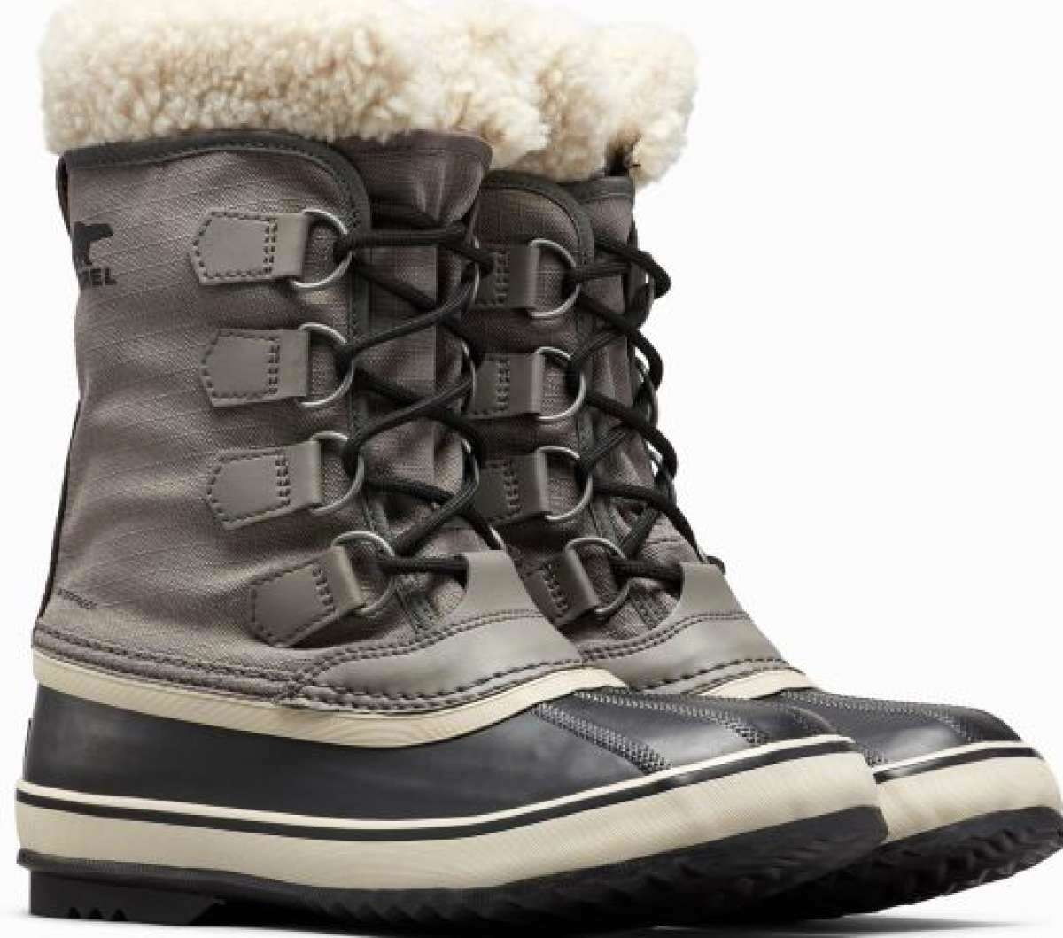 Sorel Ladies Winter Carnival Boot 2022-2023 - A pair of tall, dark brown boots with a thick cream-colored fur trim around the top and laces.